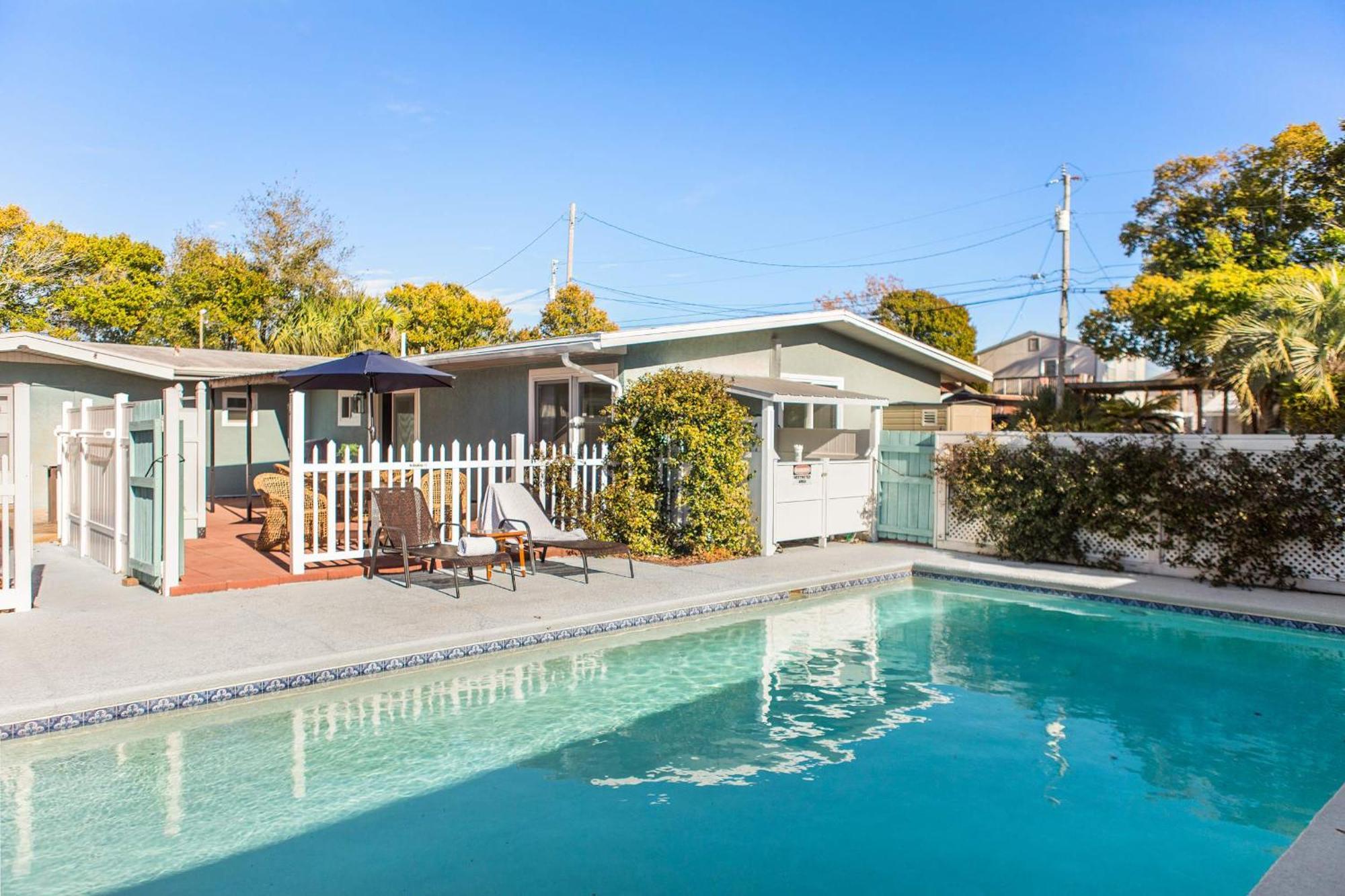 Holiday home Shells Family House Coastal Retreat With Private Pool Golf Cart & Steps To The