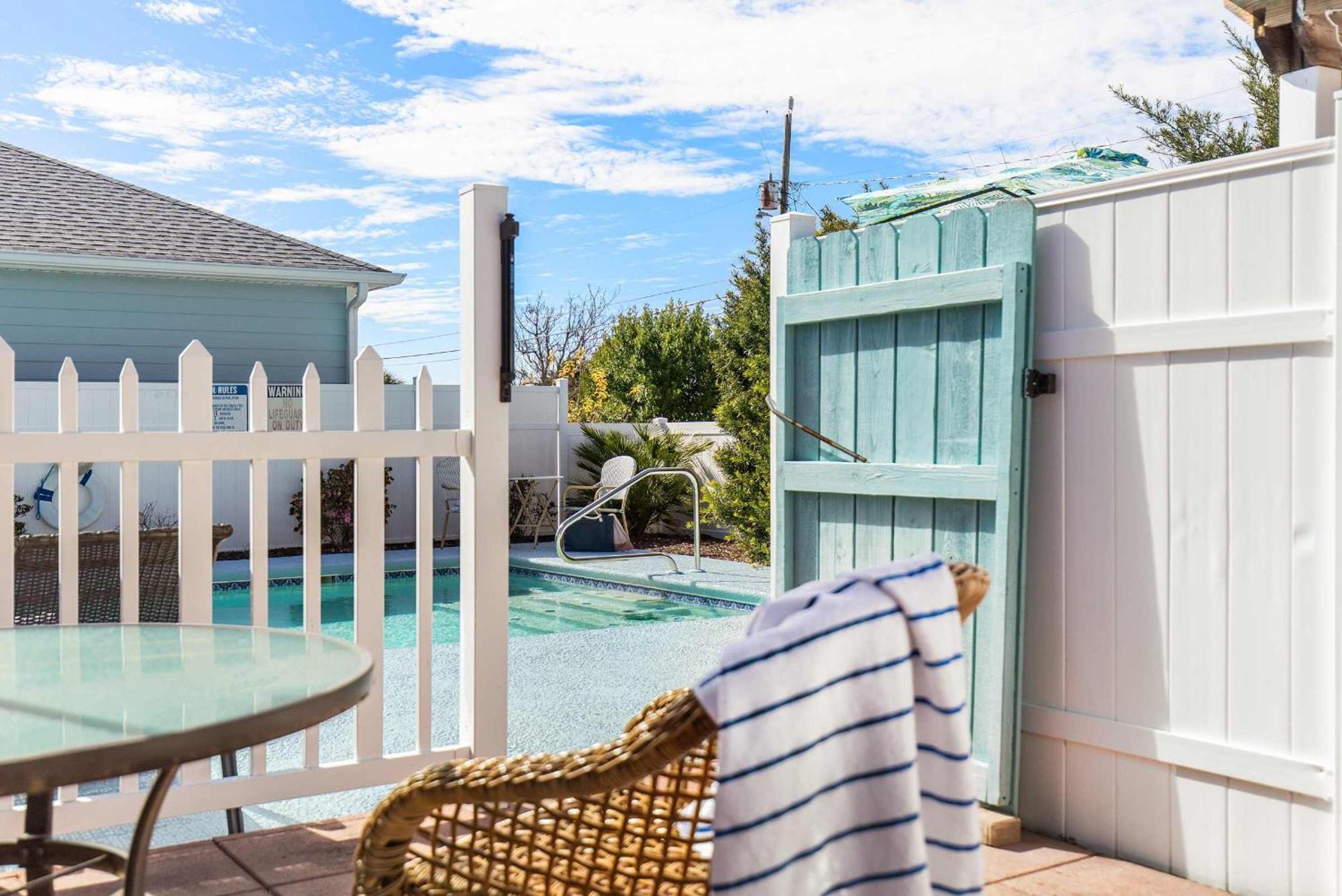 Holiday home Shells Family House Coastal Retreat With Private Pool Golf Cart & Steps To The